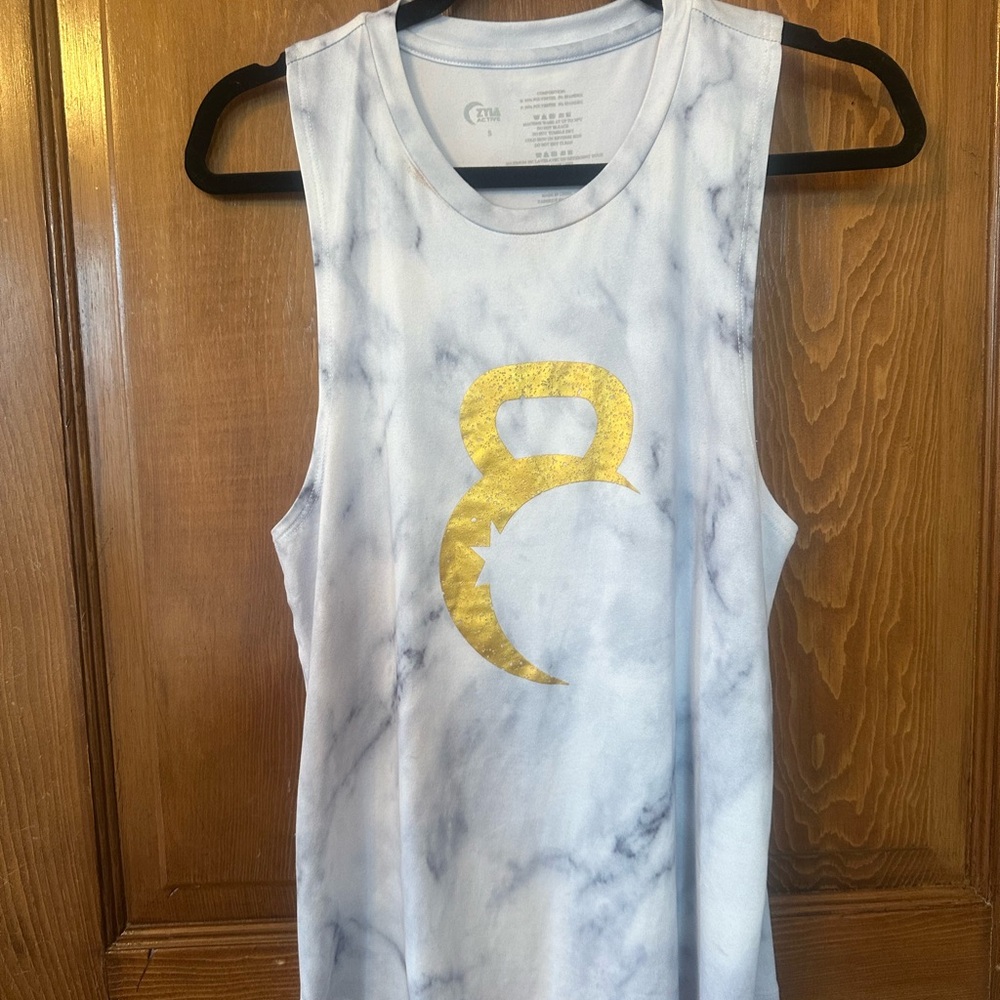 Zyia Hendrix Muscle Tank we with Gold Kettlebell Accent
